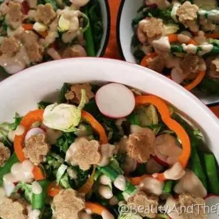 Brussels Sprouts Salad with White Bean DressingParmesan Pecan Crisps