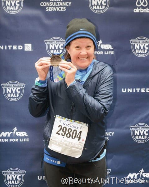 medal pose United Airlines Half Marathon Beauty and the Beets