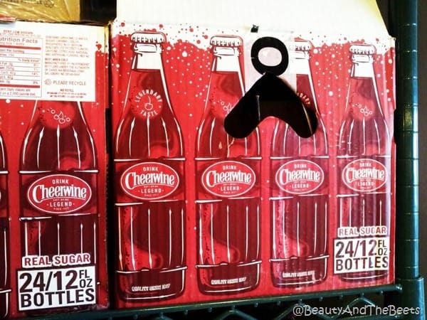 a cardboard box of Cheerwine bottles
