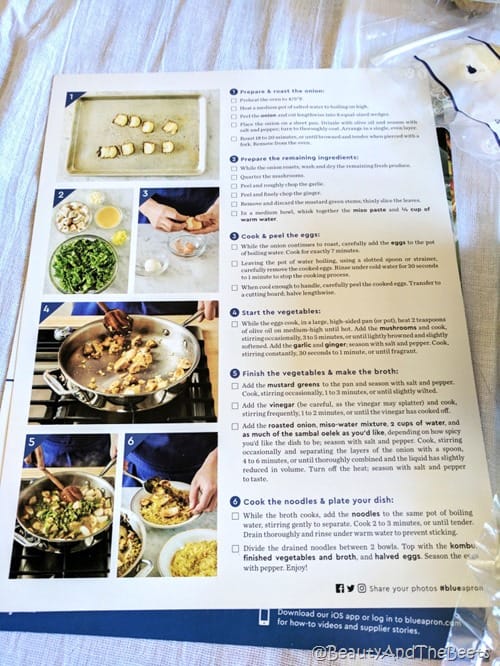 a recipe card with step by step instructions on a white tablecloth