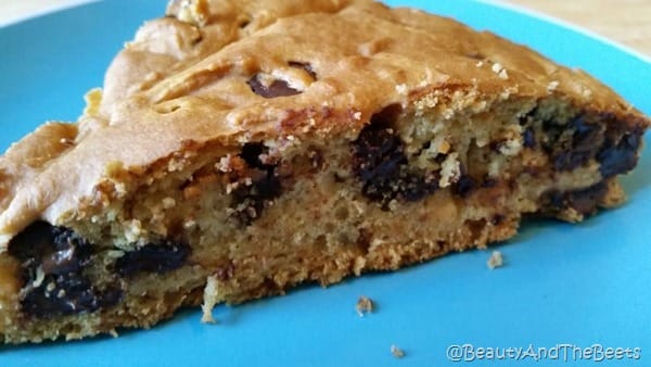 a fluffy slice of Vegan chocolate chip breakfast cake on a blue plate