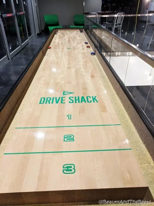 Drive Shack Lake Nona Beauty and the Beets shuffleboard