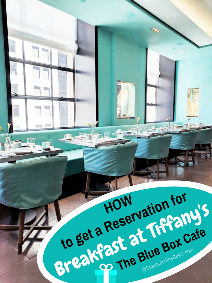 Blue Box Cafe Reservations - a dining room with Tiffany blue walls, large sunny windows, and Tiffany blue chairs