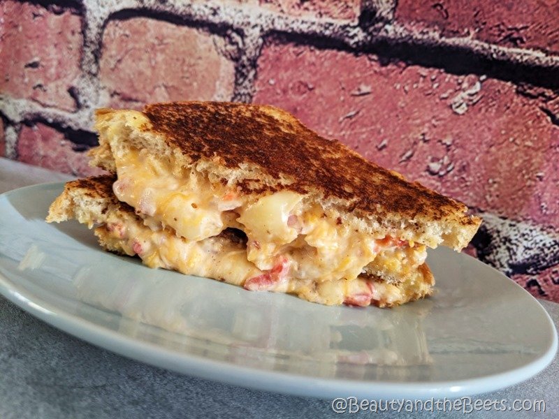 Easy and foolproof recipe for recreating the famous Masters Pimento Cheese Sandwich. Enjoy the Masters from your living room.