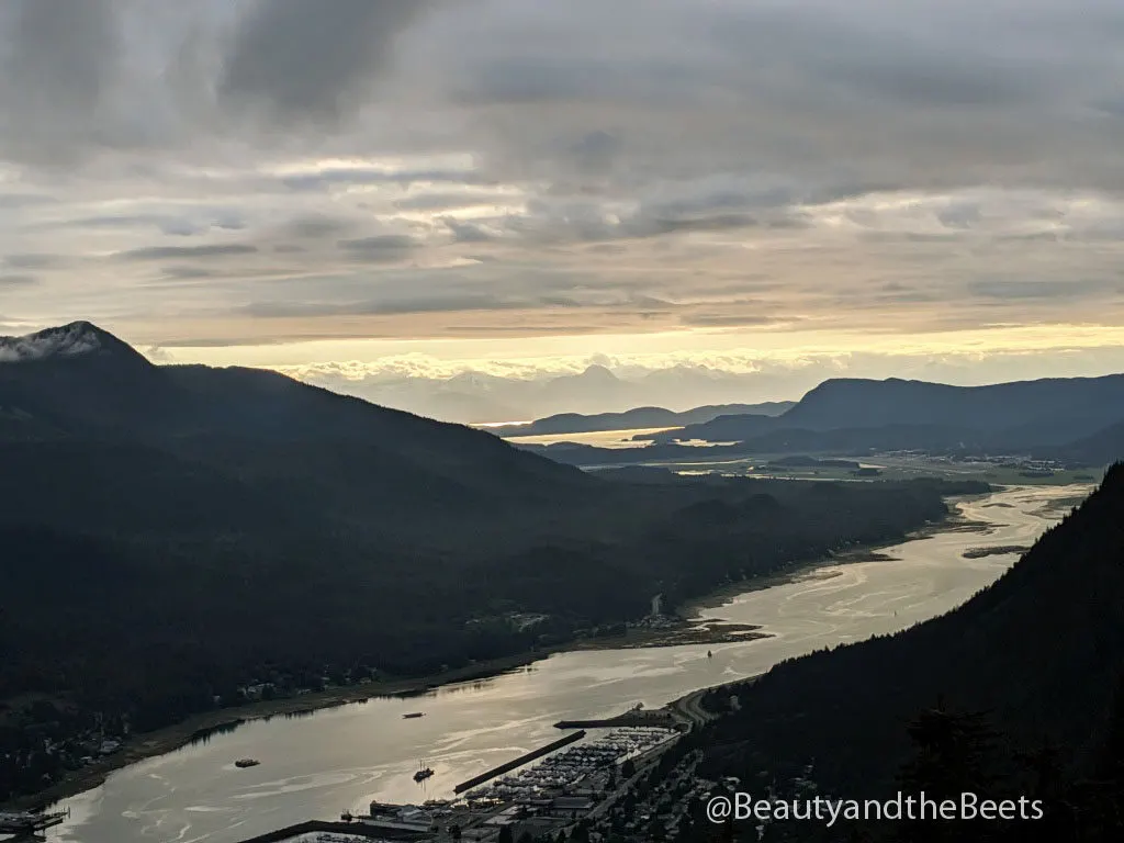 The sun sets over the Gastineau Channel and Juneau, Alaska